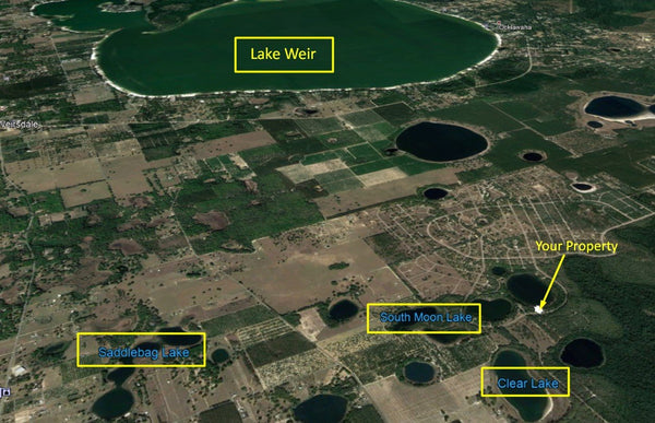 Waterfront .28 acre lot on Paved Road in Silver Springs Shores